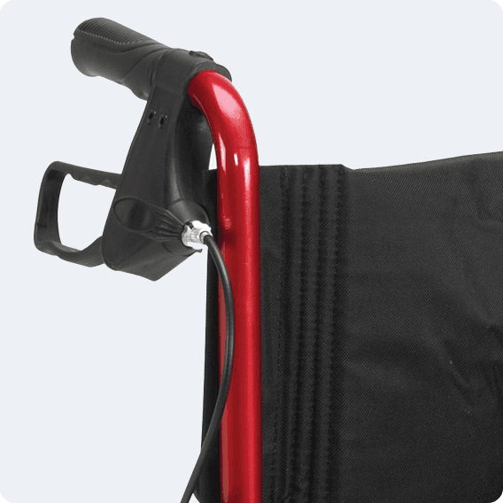 brakes located on the handlebars of a transport wheelchair